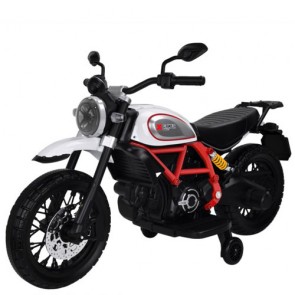 Motocicletta elettrica per bambini Ducati Scrambler Desert Sled bianca con batteria 6 Volt. Moto da corsa per bambino con tre ruote, luci e suoni.