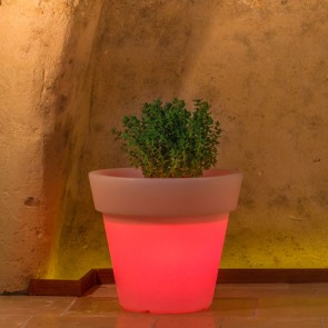 Vaso luminoso rotondo da giardino in resina bianca per esterno. Vasi luminosi circolari da interno illuminati di luce rossa, ideale per le piante del terrazzo.