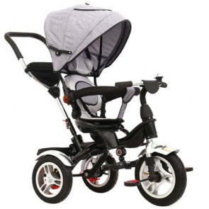 Triciclo grigio per bambino con cappottina e tre ruote gonfiabili. Tricicli passeggino a pedali per bambini