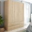 Armadio guardaroba camera da letto in legno con tre ante e quattro cassetti. Armadi per cameretta rovere con tripla anta.