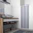 Porta a soffietto box doccia con profili in PVC  da 1,2 mm. Cabina docce bagno Flex con estensione regolabile, altezza 185 cm estensibilità 100÷80 cm.
