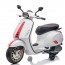 Vespa per bambini elettrica Piaggio bianca con batteria 12 volt, scooter elettrico per bambino con rotelle e sedile.